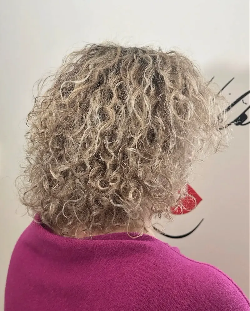 Textured perm hair result by Elika Beauty